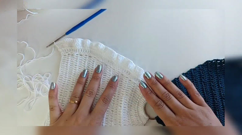Comparing white and navy crochet top panels side by side.