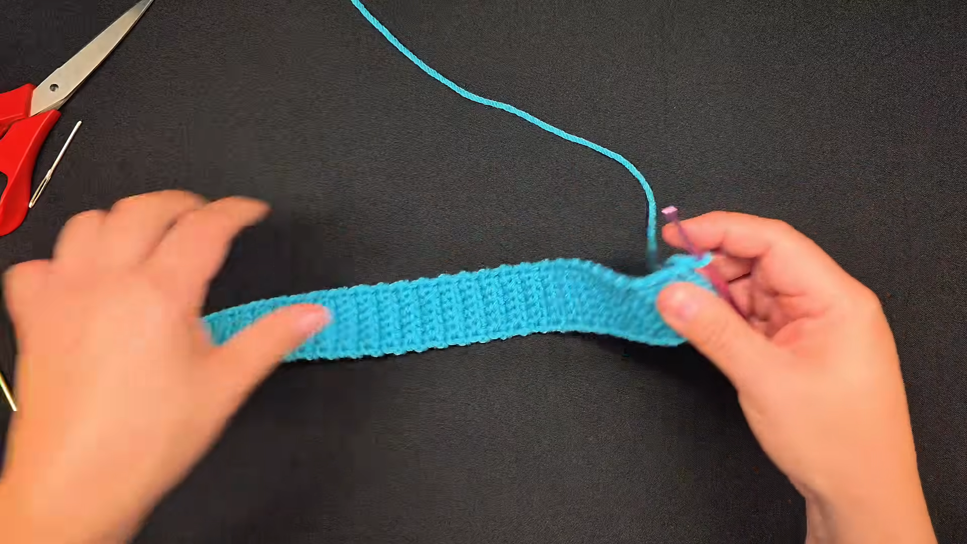 Crocheted turquoise headband strip in progress