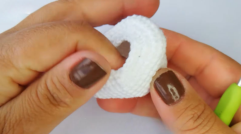 Decrease round on white amigurumi bunny head