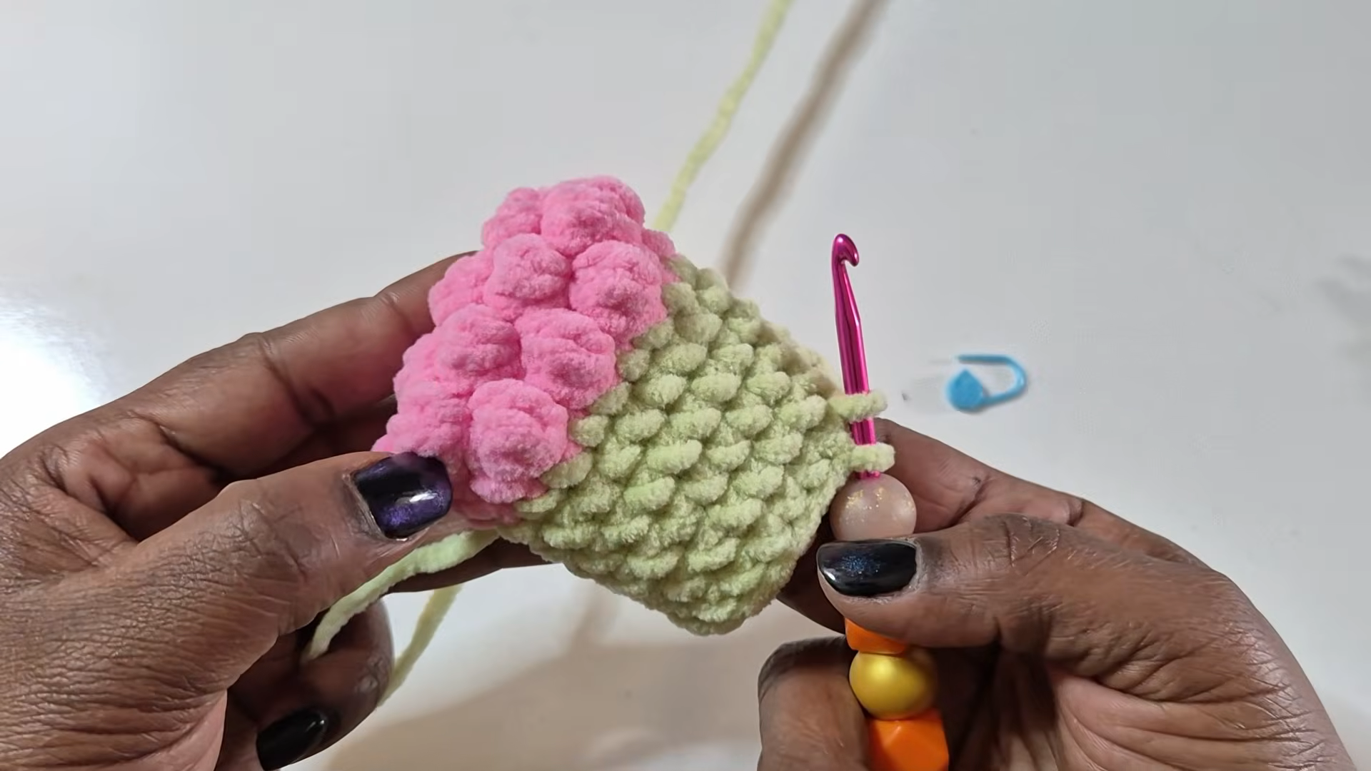 Pink and green crochet zombie body pieces