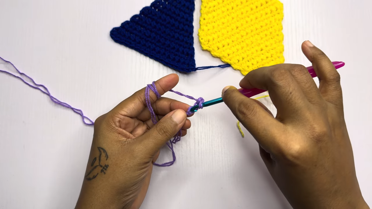 Purple yarn slip knot for crochet summer top
