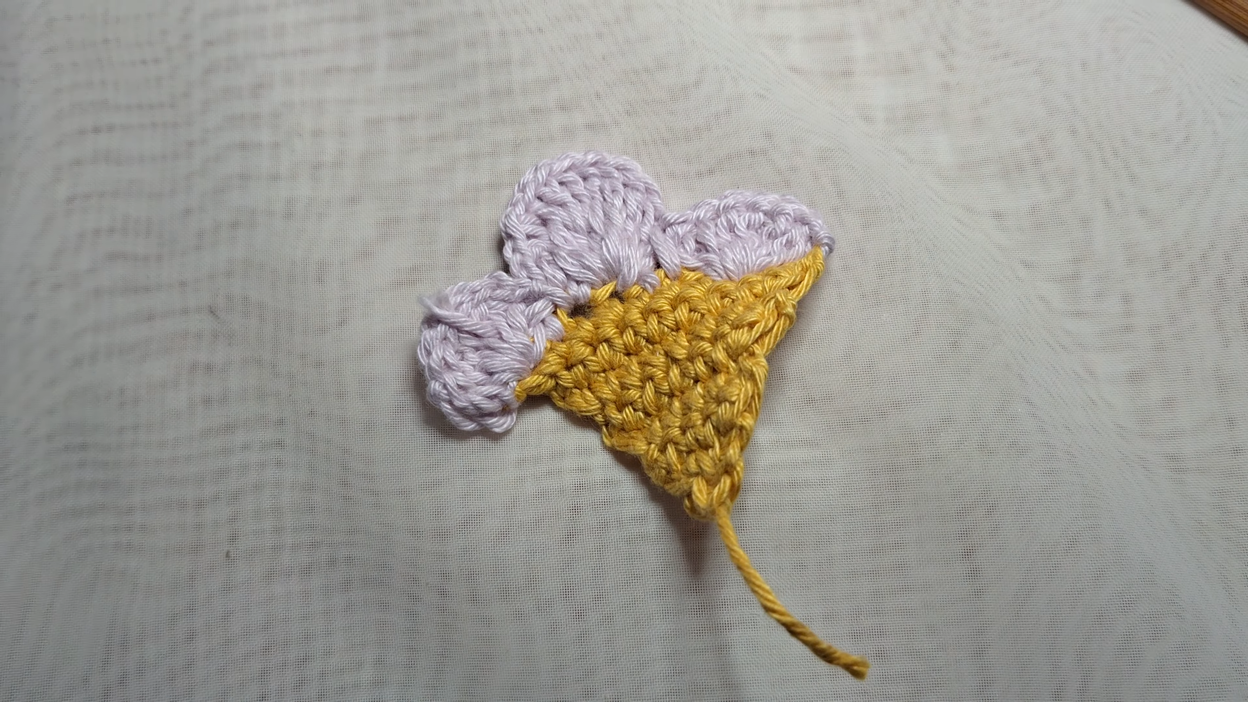 Turquoise baby headband fitted on foam head form