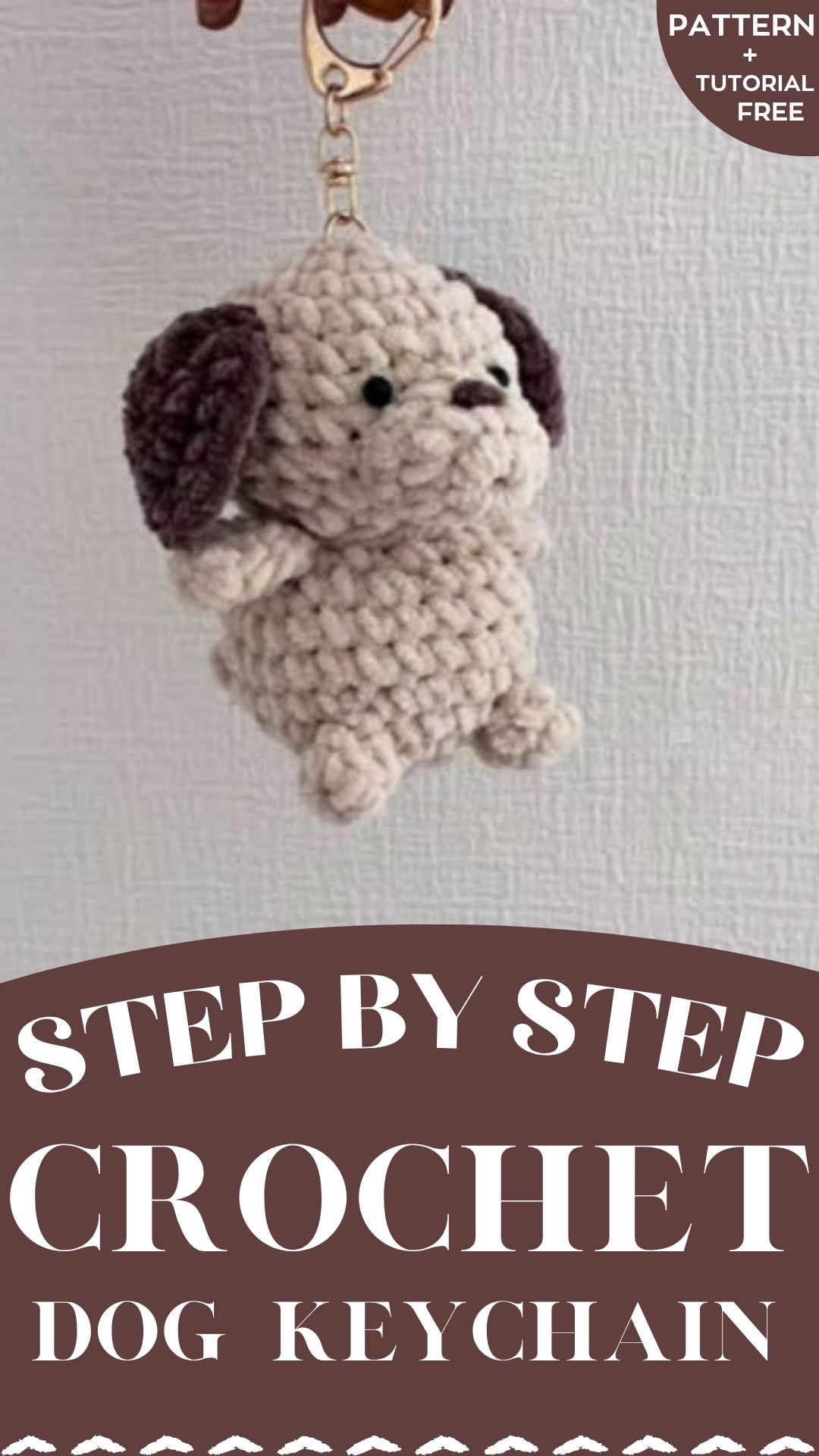 Finished crochet dog keychain pattern puppy ready to clip onto a bag