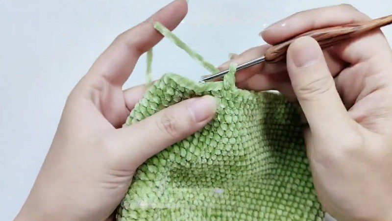Decrease evenly to shape the end.