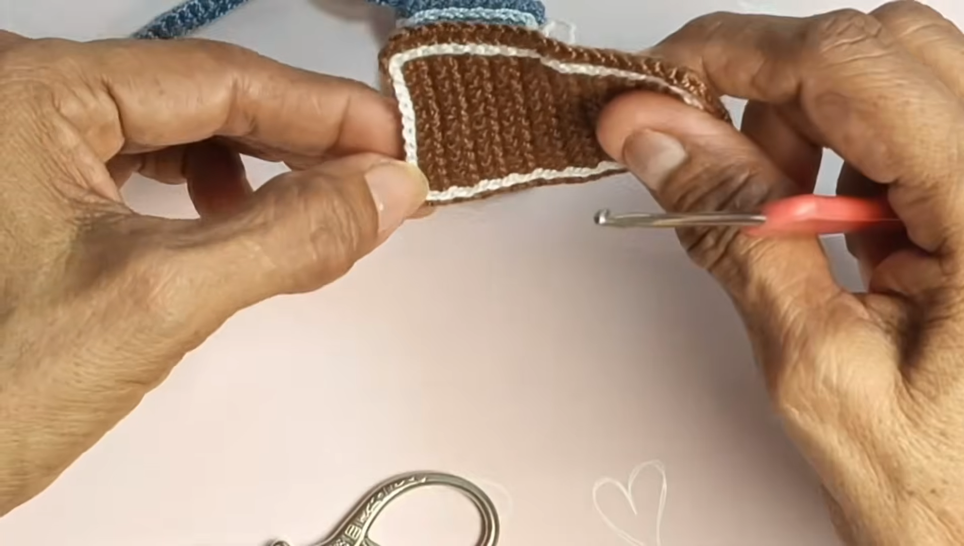 Holding the brown and white layers together.